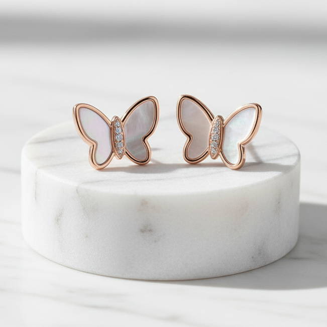 925 Sterling Silver Rose Gold Butterfly Stud Earrings with Mother of Pearl Wings – Elevated Marble Pedestal Editorial
