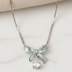 925 Sterling silver mint bow necklace by CHAKORE - Flat Lay on Marble