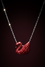 925 Sterling Silver Red swan-shaped pendant necklace on a dark background by CHAKORE