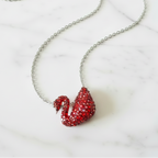 925 Silver Red Crystal Swan Slider  by CHAKORE– Marble Flat Lay
