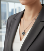 925 sterling Silver necklace with a black and sparkling cubic Zirconia Rose flower pendant  with side attached charm on model wearing Corporate office wear