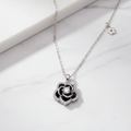 Black Rosette 925 Sterling Silver Necklace on white marble surface – CHAKORE