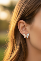 Rose Gold Plated 925 Silver Butterfly Earrings with Iridescent Mother of Pearl – On-Model Lifestyle Shot
