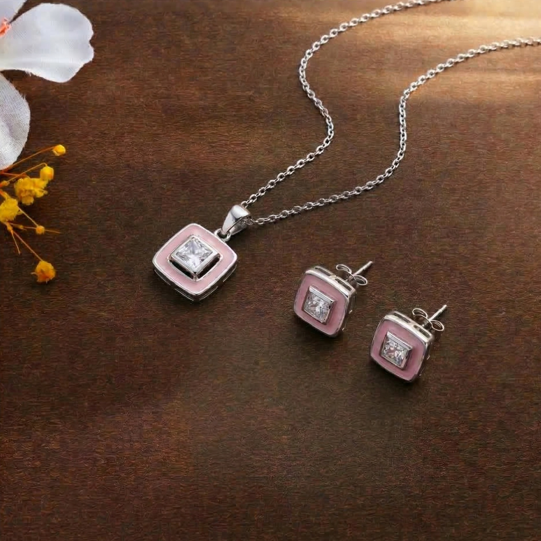 Matching square pendant necklace and stud earrings jewelry set, solid 925 sterling silver with vibrant pink cold enamel inlay bordering a central square-cut brilliant cubic zirconia stone. Minimalist, geometric design, geo jewelry, high-polish finish
