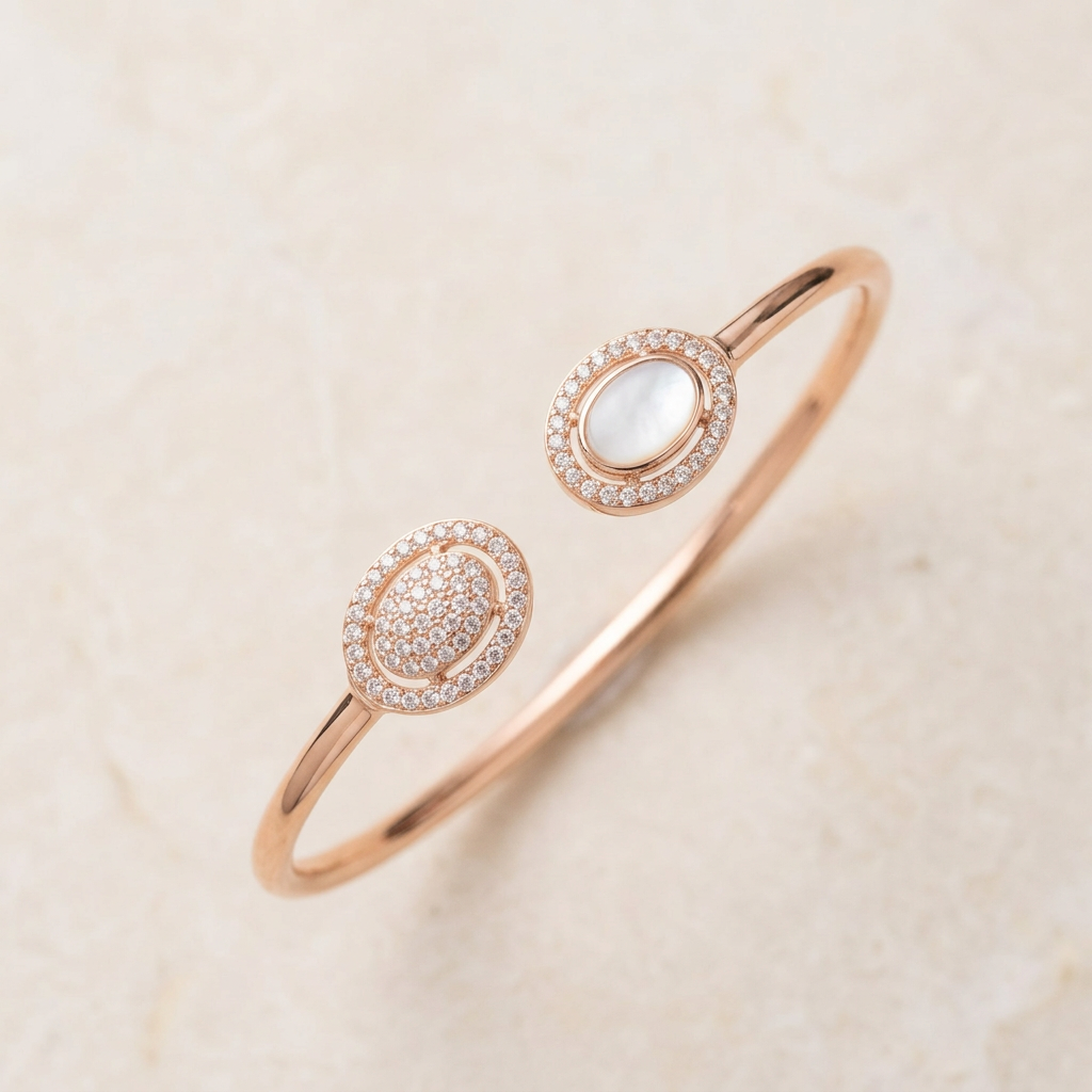 Aura Rose Dual Eclipse bracelet flat lay on ivory stone