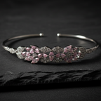 Blush Bloom Cuff 925 sterling silver bangle bracelet with blush pink marquise zirconia floral cluster, flat lay on dark slate
