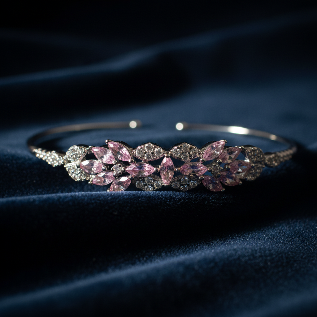 CHAKORE Blush Bloom Cuff open-cuff 925 sterling silver bangle with pink marquise and pavé cubic zirconia stones on navy velvet