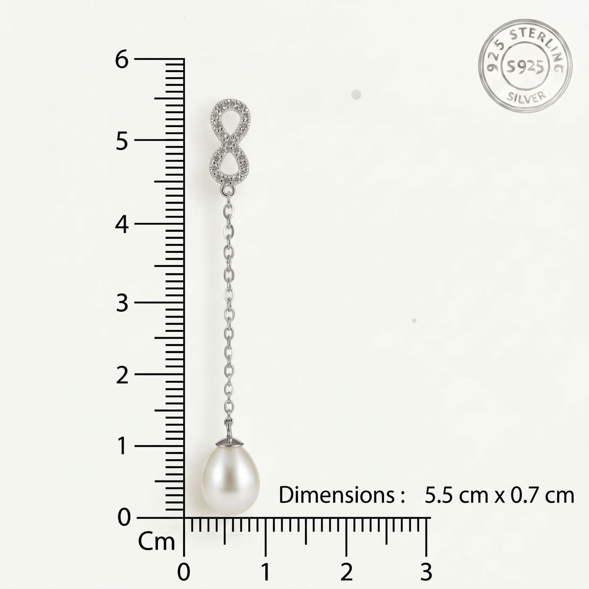 CHAKORE 925 sterling silver infinity freshwater pearl earring beside a centimetre ruler on white, labelled 5.5 cm by 0.7 cm