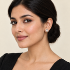 Model wearing CHAKORE hypoallergenic 925 sterling silver freshwater pearl stud earrings with twisted rope borders.