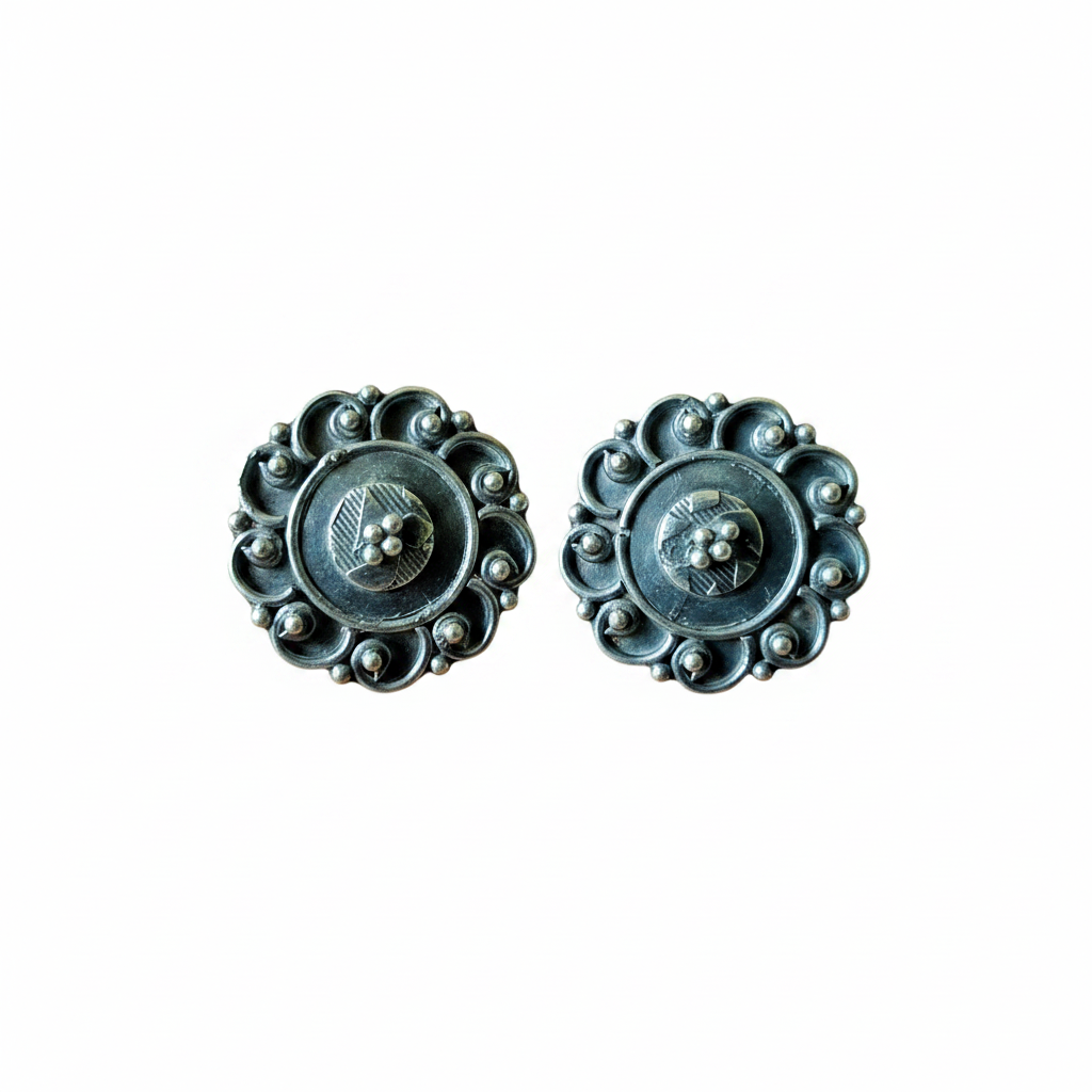 Classic Lunar Oxidised 925 silver stud earrings held between fingers for size reference – handcrafted mandala filigree ethnic studs by CHAKORE