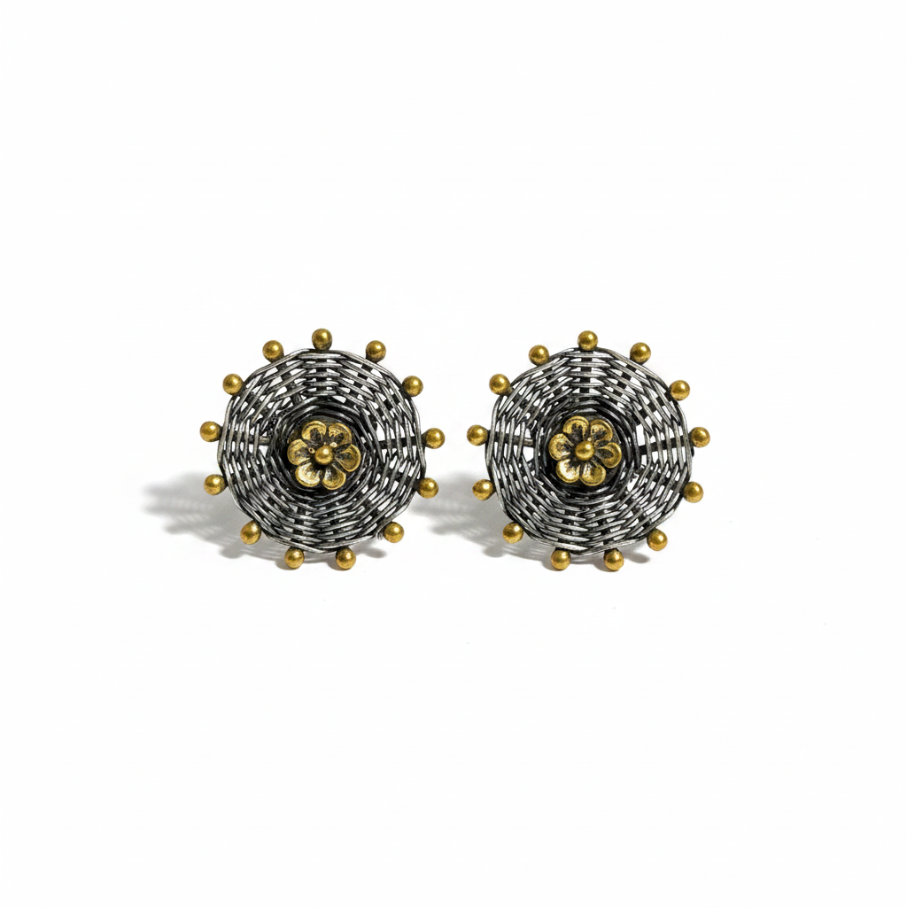 Pair of oxidised silver stud earrings with gold flower centre and bead border on white background — CHAKORE 925 silver jewellery
