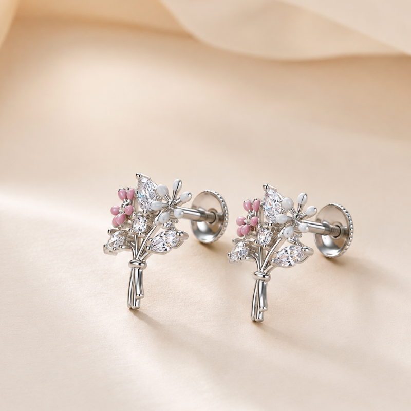 Close-up of Chakore pink and white floral 925 sterling silver stud earrings showing the South Indian screw back mechanism with one screw cap attached and one removed. Hypoallergenic, tarnish-resistant rhodium-finished silver earrings with secure Madras screw closure for everyday comfort.