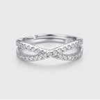 Crossover Infinity 925 Sterling Silver Ring by CHAKORE with Pavé Cubic Zirconia – Adjustable Band Silver ring with diamond accents on a light gray background