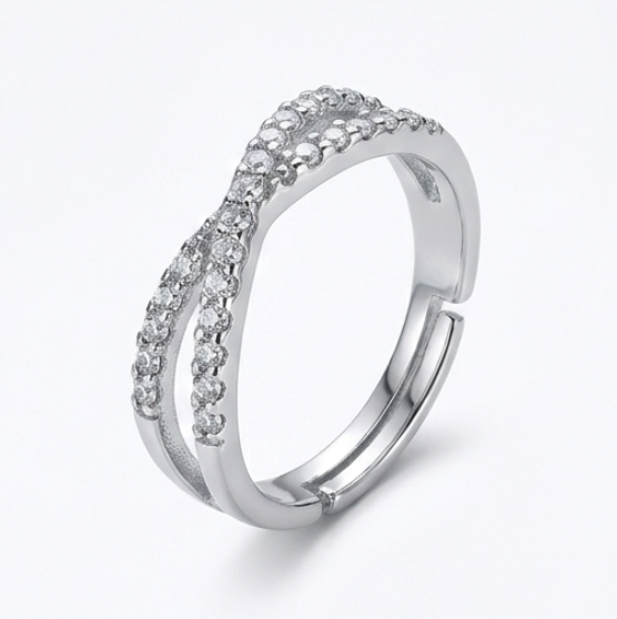 Crossover Infinity 925 Sterling Silver Ring Silver ring with diamond accents on a white background at 45 angle
