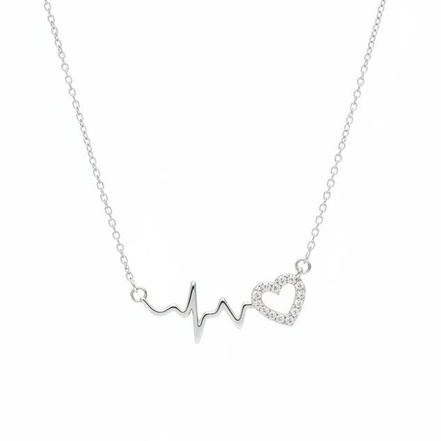 A delicate silver necklace featuring an EKG heartbeat line design with one open heart and one filled heart, both adorned with small clear stones, suspended from a fine silver chain against a plain white background.