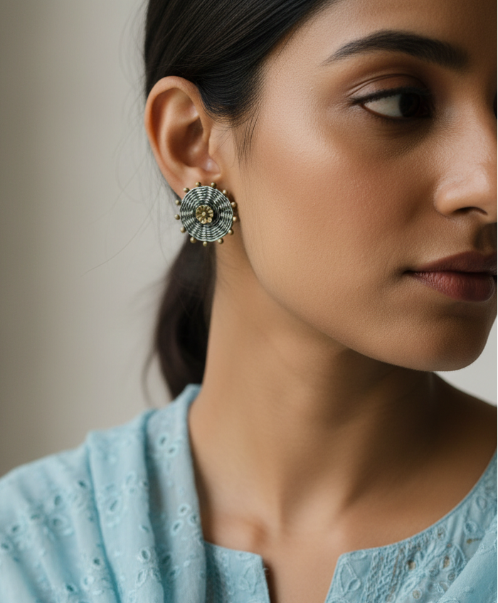 925 Oxidised Silver Flower Studs by CHAKORE on a model wearing Light Blue Indian ethnic Lifestyle