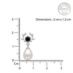 A sterling silver earring by CHAKORE with a black round stone and antler-like branches, hanging from a white teardrop-shaped pearl, shown with a centimeter ruler for scale and a 925 sterling silver stamp on a white background.