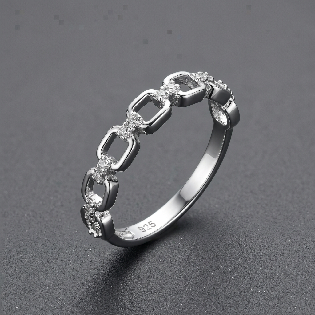 Silver ring on a charcoal grey background
